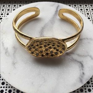 Gold bracelet with black crystals